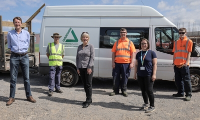 Image of kickstart apprentices with a white van with an Esh logo on the side
